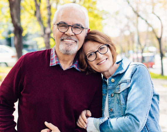 happy-smiling--middle-aged-couple-for-Pinhole-Gum-Rejuvenation